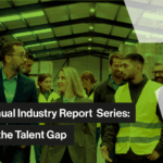 Group of executives and warehouse workers walking and talking