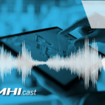 A hand scrolling a tablet showing advanced machinery and AI.