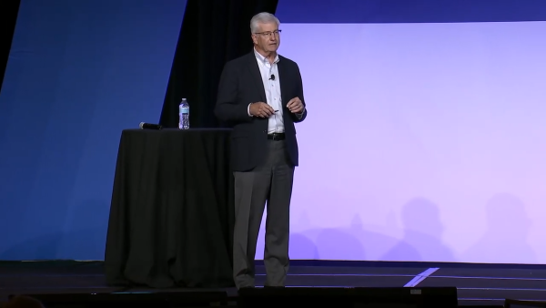 Speaker discussing employees